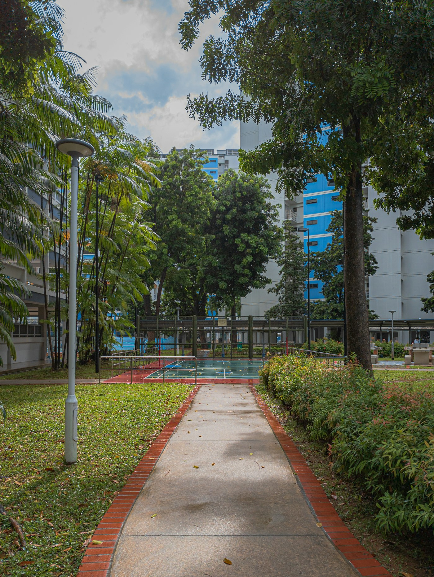 Walkway toward housing blocks near Chin Swee Road, useful as a landmark when visiting by appointment