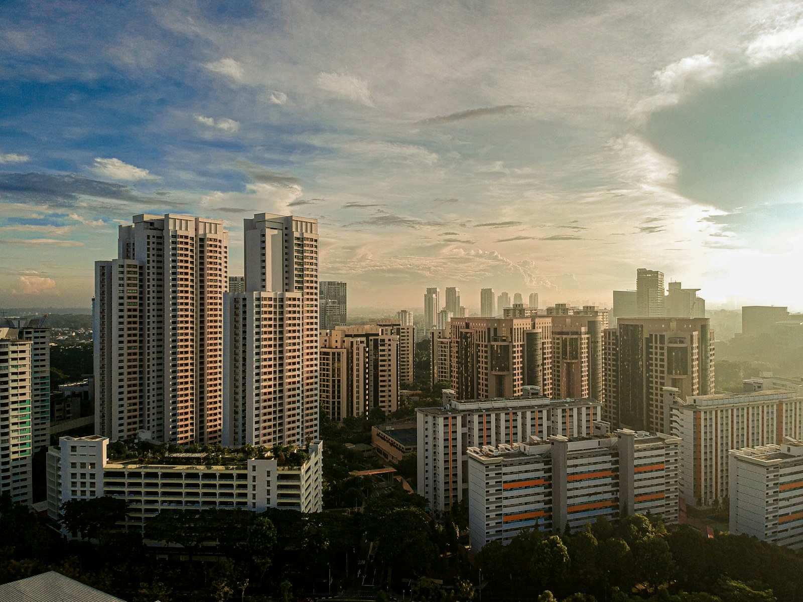 Sunset view across Singapore HDB housing blocks of the kind that define Chin Swee Road and Outram estates
