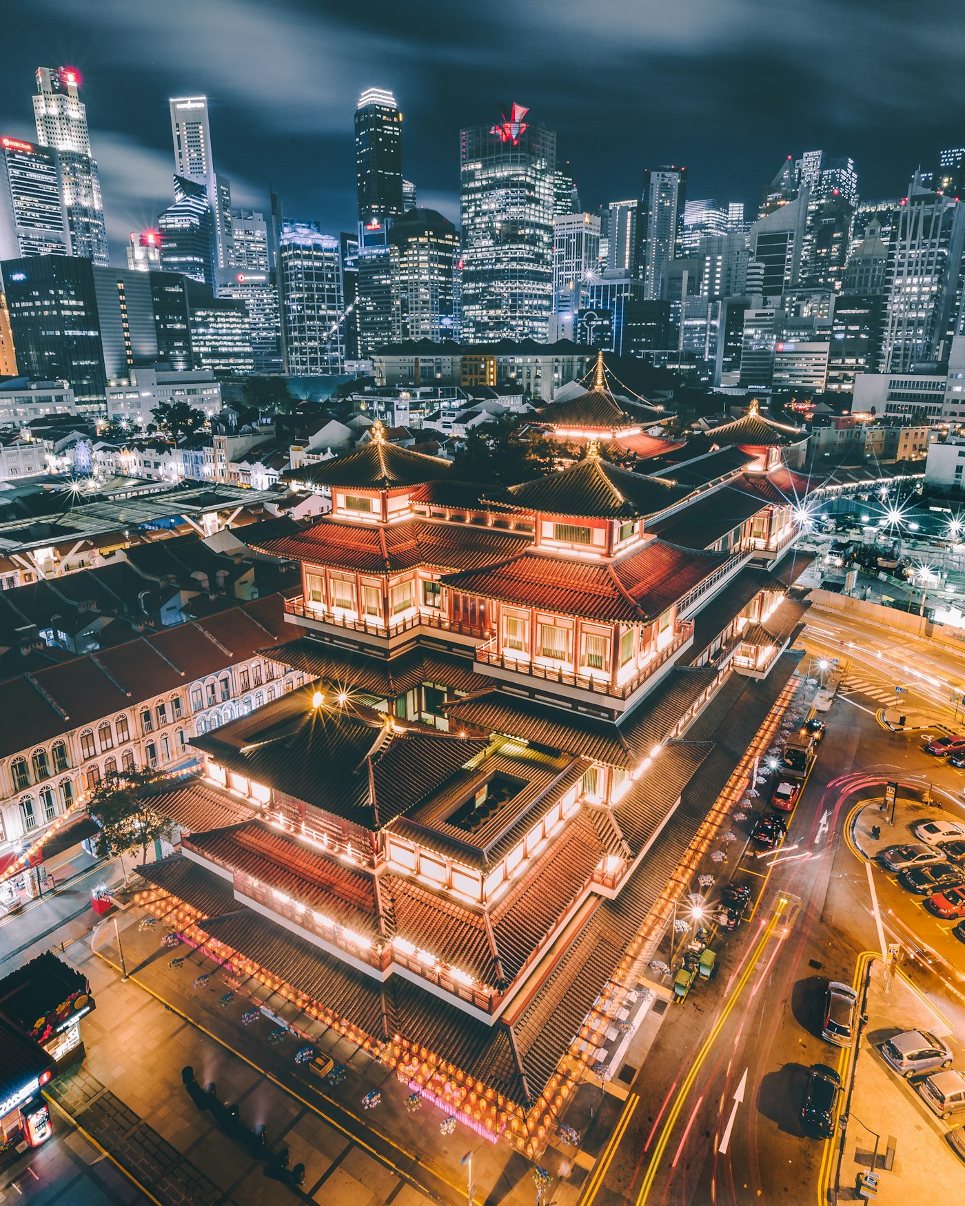 Chinatown temple and skyline at night, the district next to our Singapore office